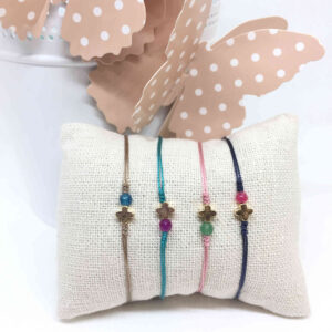 Pulsera cruz dorada y piedra jade