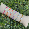 Pulsera perla cristal con hilo trenzado y bolas acero dorado - Imagen 2