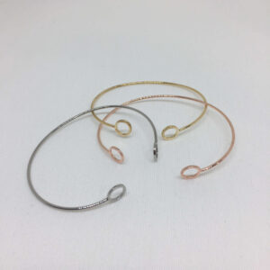 Pulsera rígida con terminales en círculo