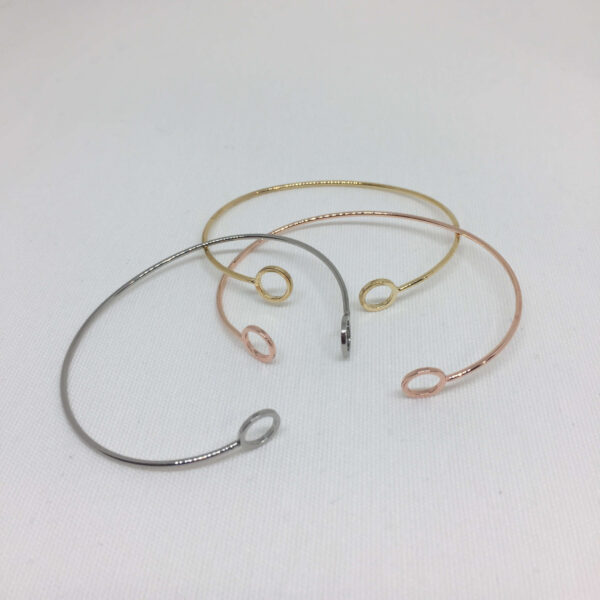 Pulsera rígida con terminales en círculo